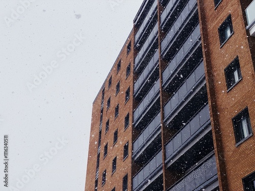 Modern Brick Apartment Building in Snowfall