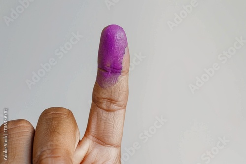 Close up of little finger with purple ink after voting in Indonesia. photo