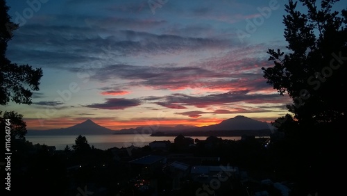 Amanecer Puerto Varas, Chile. Volcanes Osorno y Calbuco. photo