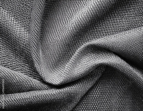 Dark colored fabric folds as background texture