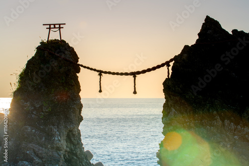 Meoto Iwa, or Married Couple Rocks, the couple rocks represent as the wedded couple in the Nomozaki area, the southern part of Nagasaki city in Kyushu, Japan photo