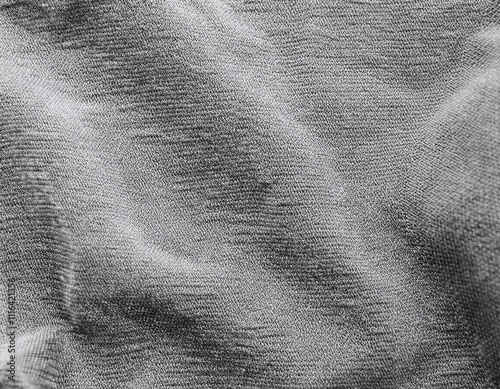 Dark colored fabric folds as background texture