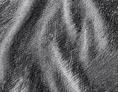 Dark colored fabric folds as background texture