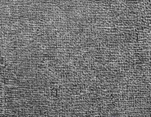 Dark colored fabric folds as background texture