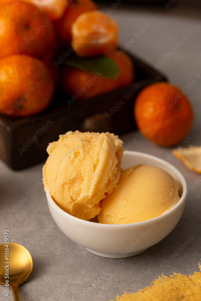 Balls of natural tangerine ice cream Balls of natural tangerine ice cream