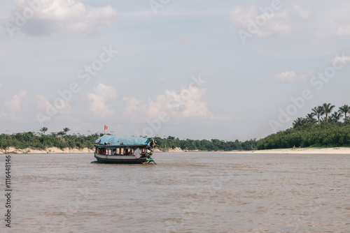 Traditional means of transportation in the Peruvian Amazon on the Nanay River in Iquitos photo