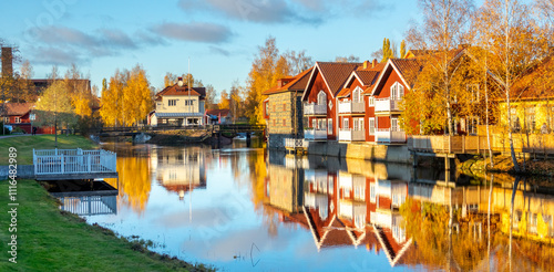 Old tow of Falun with traditional, picturesque, red wooden houses in the city of Falun in Dalarna, Sweded photo