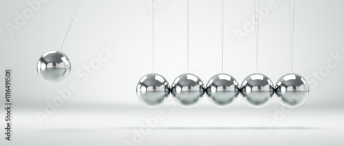 Newton's cradle demonstrating conservation of momentum and energy