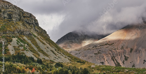 Sunlight and Shadows on Rugged Mountain Landscape in Iceland
