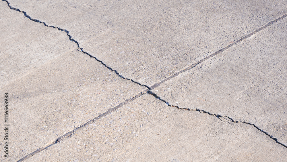 Fototapeta premium Broken crack lines texture on the old damaged concrete floor background