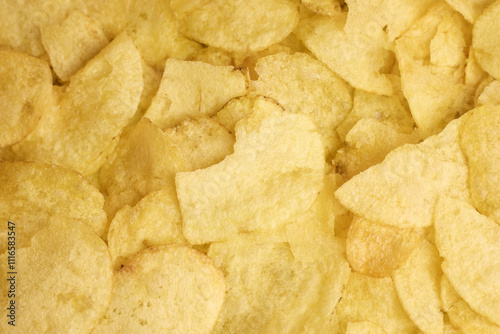 A closeup image showcasing the delightful, crispy, and crunchy texture of potato chips