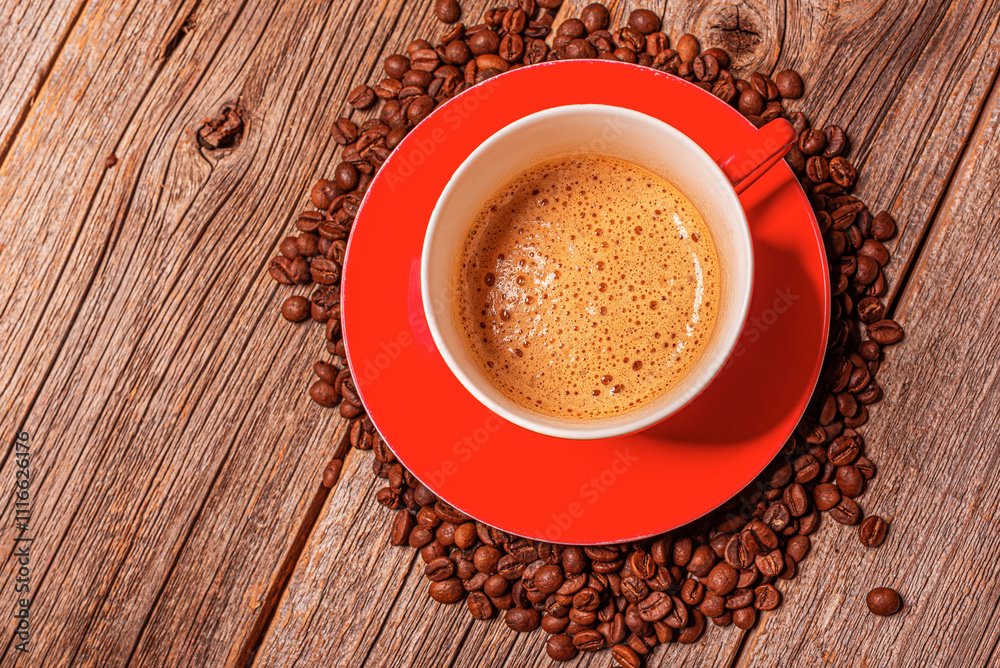 A cup of aromatic coffee on a wooden table.