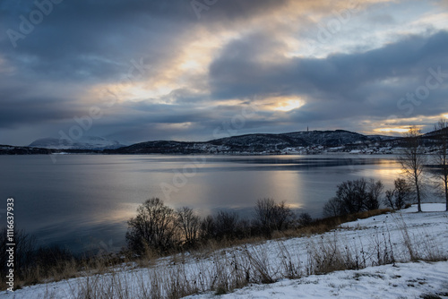 Sunset at the snow covered landscape, Harstad, Norway photo