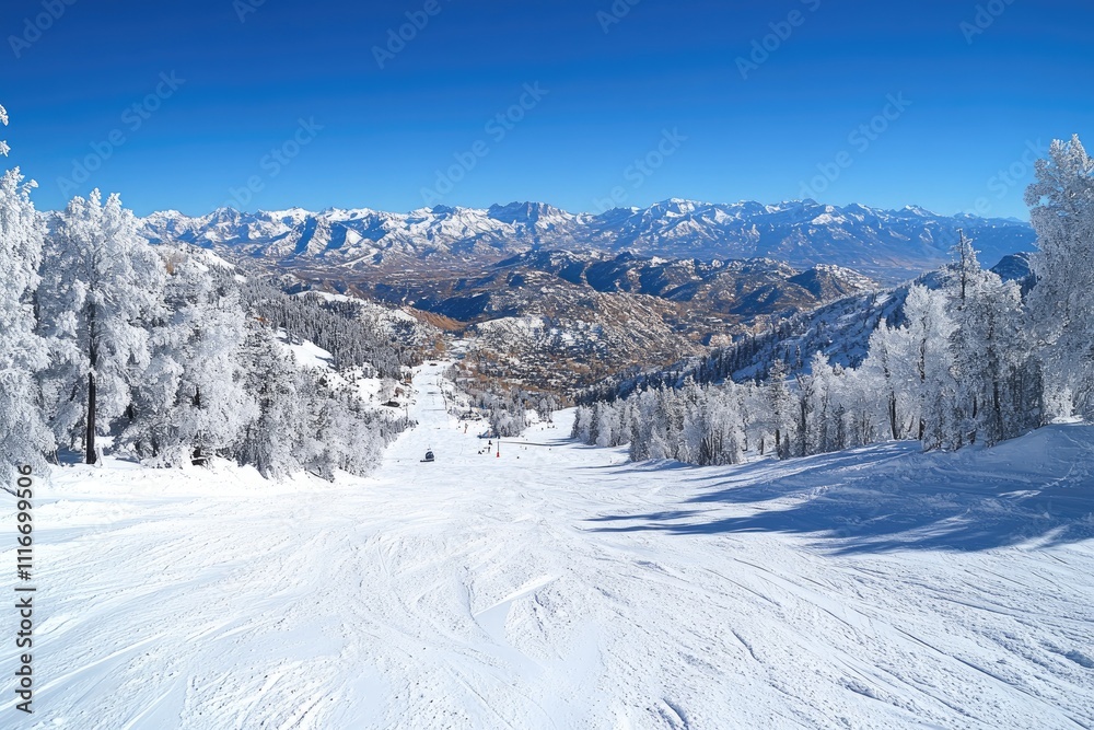 Snow grooming machines preparing ski slopes in a sunny winter mountain landscape Snow grooming machines preparing ski slopes in a sunny winter mountain landscape