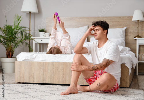 Upset young man and his wif...