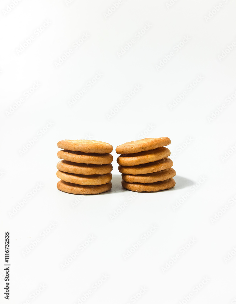Stack of biscuit crackers. Four different shapes with sugar isolated on a white background Stack of biscuit crackers. Four different shapes with sugar isolated on a white background