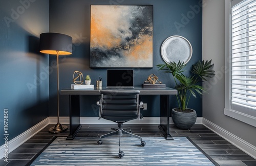 Black modern desk with laptop computer standing in home office photo