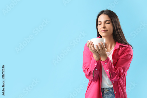 Beautiful woman with cup of...
