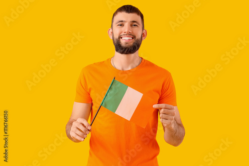 Handsome man with flag of I...