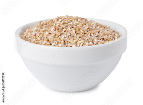 Dry wheat groats in bowl isolated on white