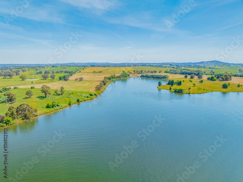 Aerial daytime views over Carcoar Dam with high cloud photo