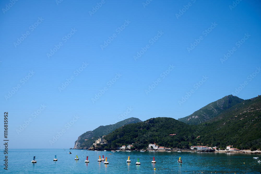 Obraz premium Ocean view with yachts and Forte de Santa Maria da Arrabida Portugal. 2024.