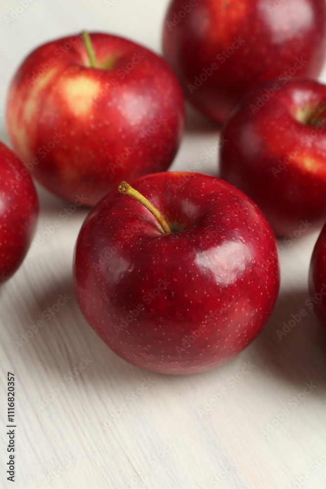 Fresh ripe red apples on white wooden table, closeup Fresh ripe red apples on white wooden table, closeup