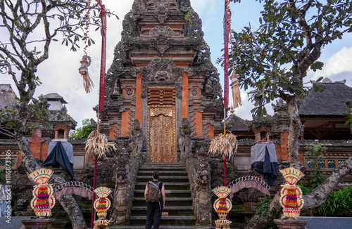 Woman in a beatiful temple in Bali photo