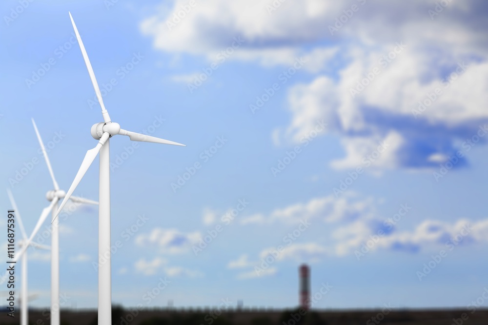 Fototapeta premium A row of tall white wind turbines at blue sky