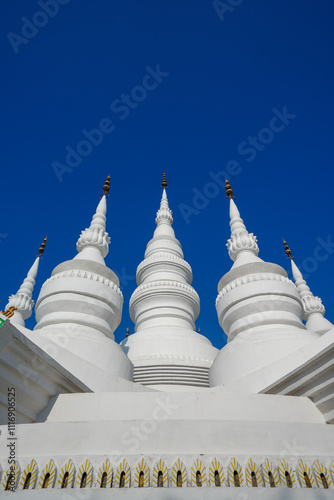 Mini view of Manfeilong White Pagoda in Dai Scenic Area of China Ethnic Museum photo