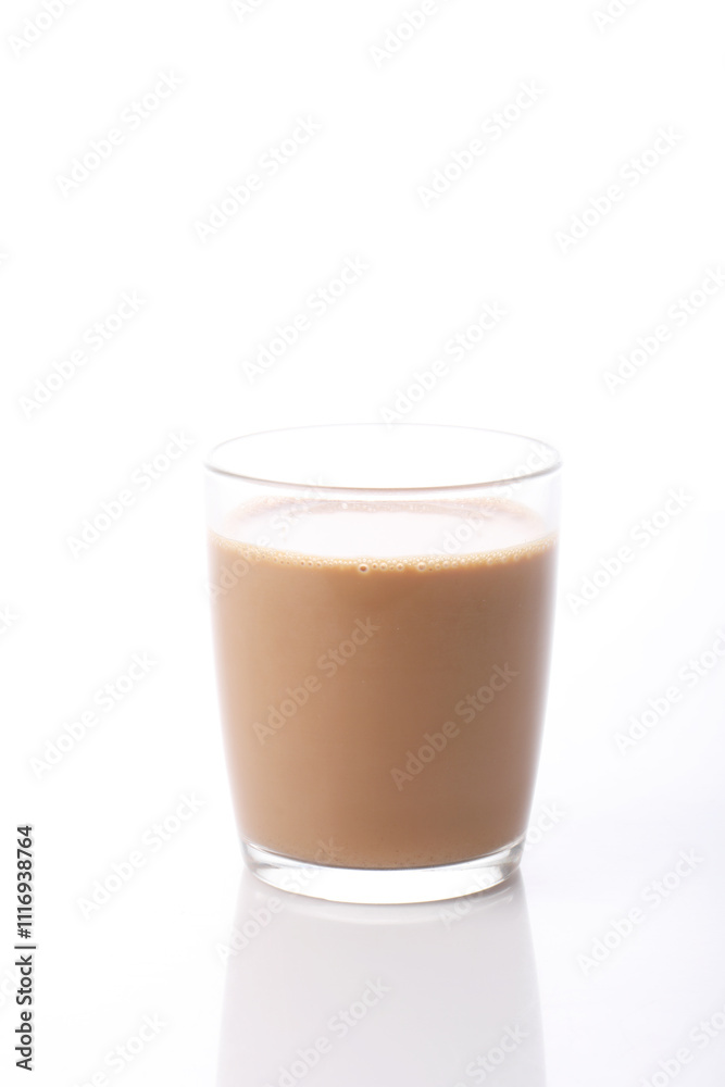 Hot masala tea masala chai Teh Tarik, Kerala India. Evening tea with refreshing Indian blend of black tea with milk and spices Hot masala tea masala chai Teh Tarik, Kerala India. Evening tea with refreshing Indian blend of black tea with milk and spices