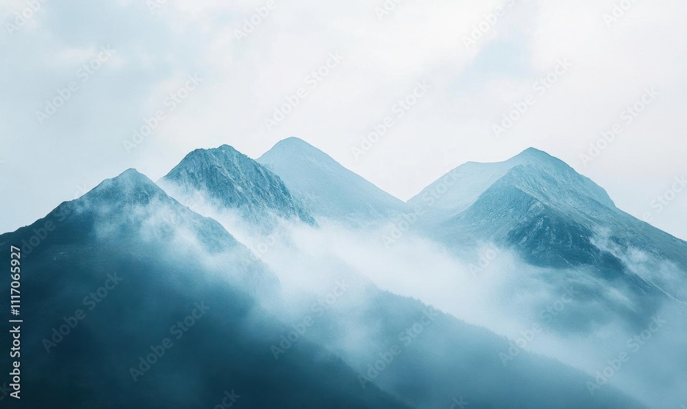 custom made wallpaper toronto digitalMisty mountains shrouded in clouds create a serene landscape.