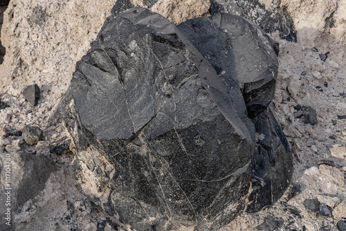 Obsidian Butte on the south shore of the Salton Sea. Calipatria, Imperial County, California. The Salton Buttes lie within the Salton Sea Geothermal Field. Rhyolite. dry lake bed. photo