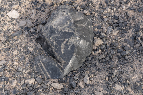 Obsidian Butte on the south shore of the Salton Sea. Calipatria, Imperial County, California. The Salton Buttes lie within the Salton Sea Geothermal Field. Rhyolite. dry lake bed. photo