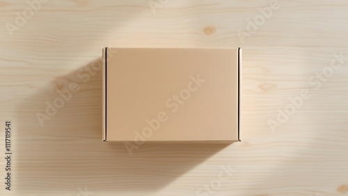 Simple cardboard box on a light wooden surface, perfect for eco-friendly packaging, minimalistic designs, and rustic branding. Ideal for product display, natural aesthetics, and sustainable visuals. photo