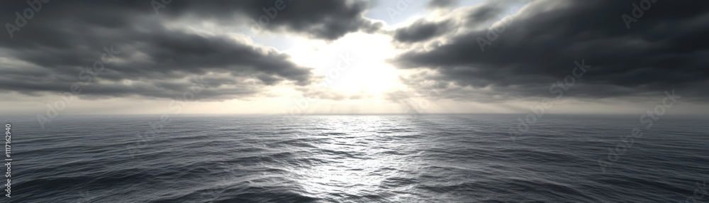 Fototapeta premium A serene ocean view under cloudy skies, with rays of light breaking through the clouds.