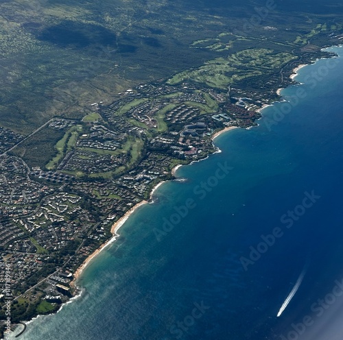 Looking down from airplane at Maui island  photo