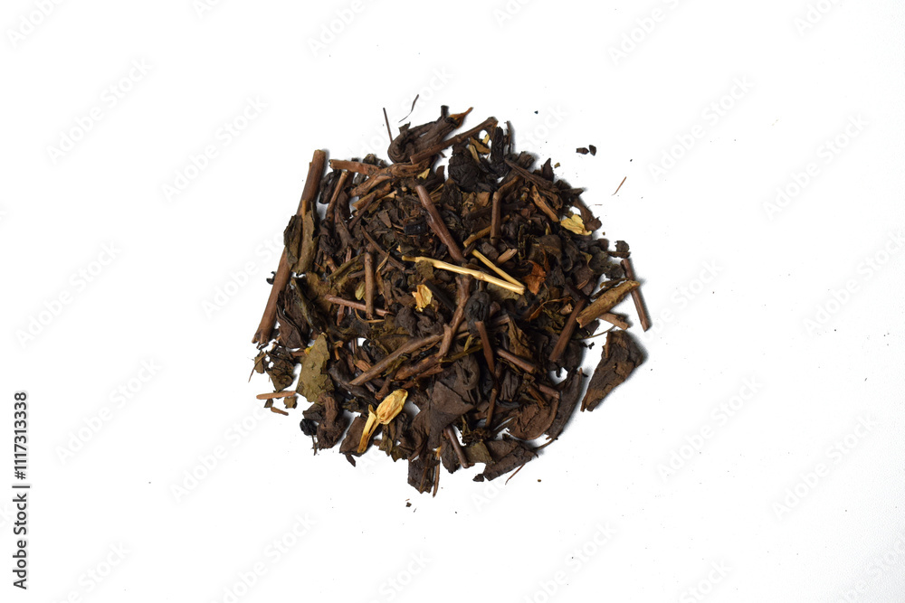 Fototapeta premium Dried tea leaves pile isolated on a white background, view from above. Top view.