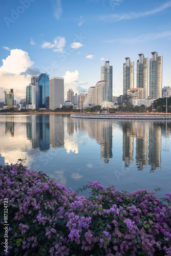 View from Benchakitti Park garden towards Asok in Bangkok, Thailand.