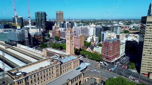 Drone aerial landscape of Sydney's Central city train station in Sydney with clock tower Haymarket Surry Hills Belmore Park CBD urban buildings skyline