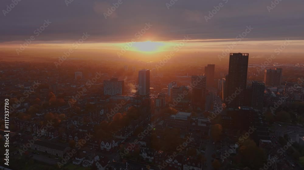 Establishing aerial view towards Croydon hazy sunset cityscape high rise residential blocks Establishing aerial view towards Croydon hazy sunset cityscape high rise residential blocks
