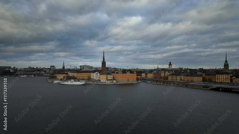 Traffic crossing bridge in Stockholm with scenic view of Riddarholmen and City Hall, timelapse Traffic crossing bridge in Stockholm with scenic view of Riddarholmen and City Hall, timelapse
