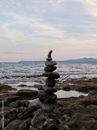 Serene Stone Cairn by the Shore
