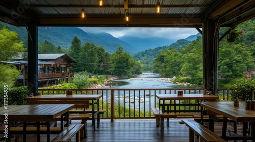 Serene River View from Scenic Deck Surrounded by Lush Mountains