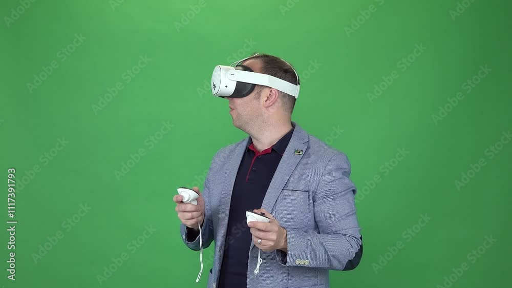 Meta Quest 3s new VR set. Trying VR virtual reality. Green Screen background. Young adult white male. Meta Quest 3s new VR set. Trying VR virtual reality. Green Screen background. Young adult white male.