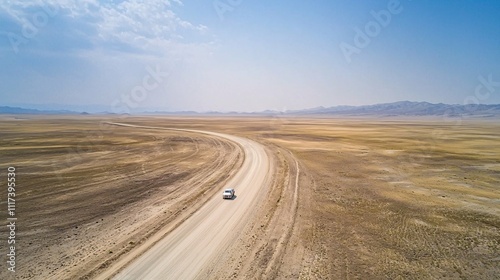 A solitary vehicle navigates an endless road through expansive landscapes, embodying freedom and the spirit of adventure.