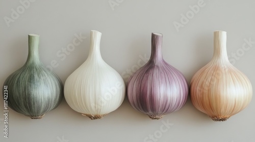 Four isolated garlic cloves on a pure white background, natural food photography concept.