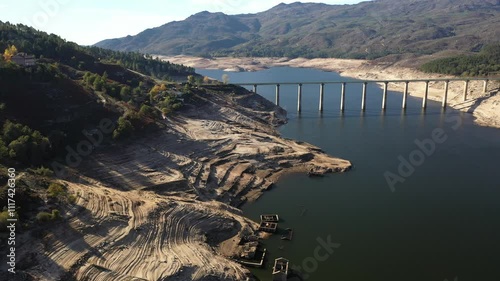 Drone Footage Of Ancient Village Ruins In A Reservoir Sunny And Clear Day