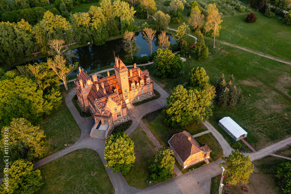 Fotografia Jaunmoku brick medieval castle and its territory near Tukums, Latvia, drone view