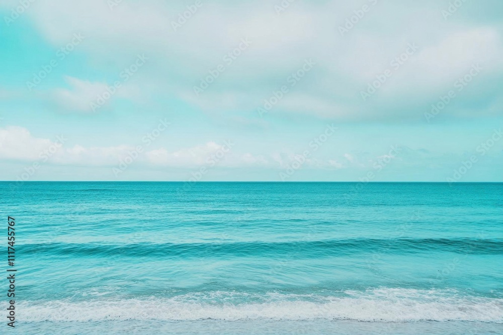 A serene ocean view with gentle waves and a tranquil sky. A serene ocean view with gentle waves and a tranquil sky.
